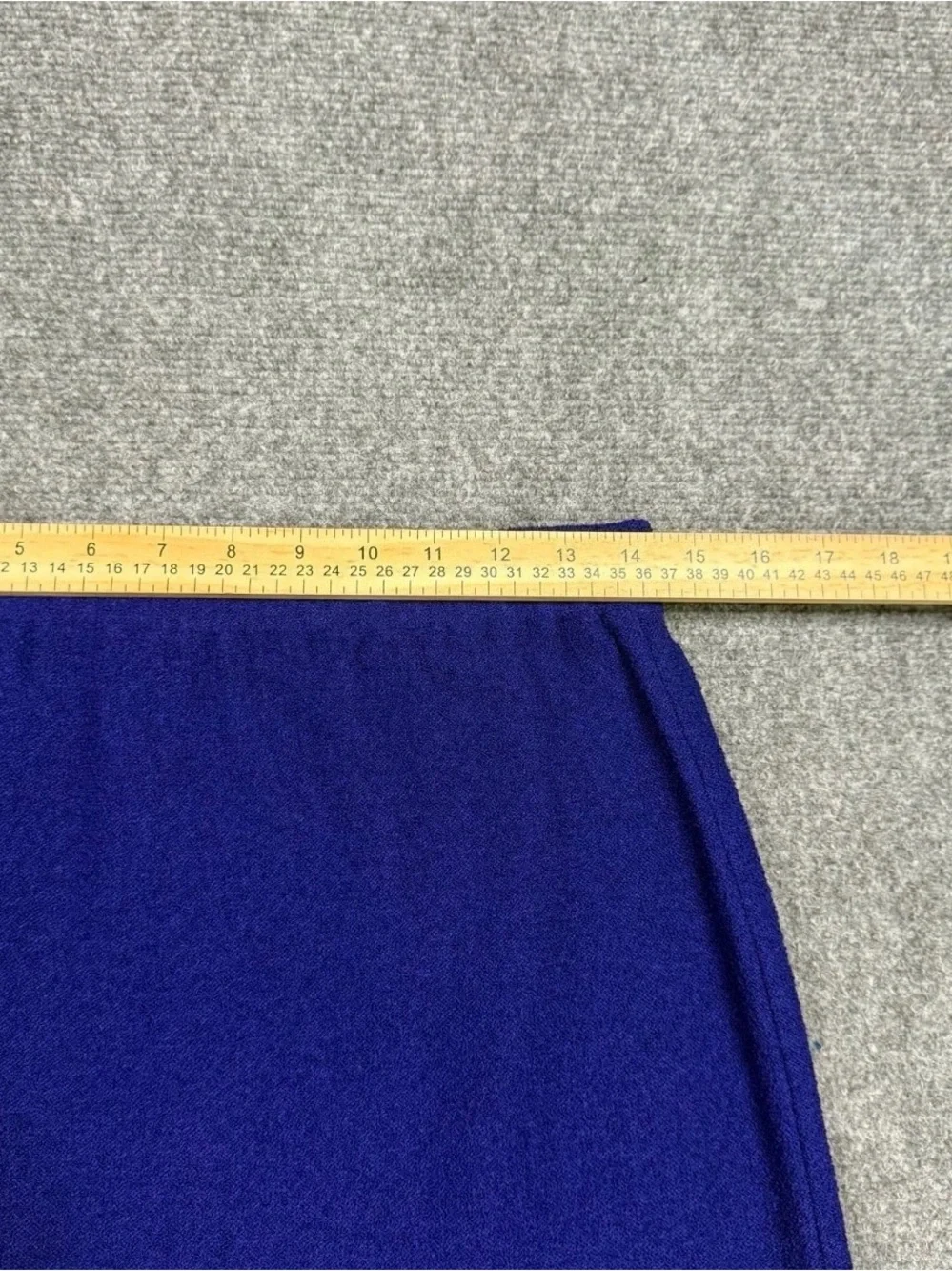 St. John Collection Blue knit skirt suit features a jacket Size 12